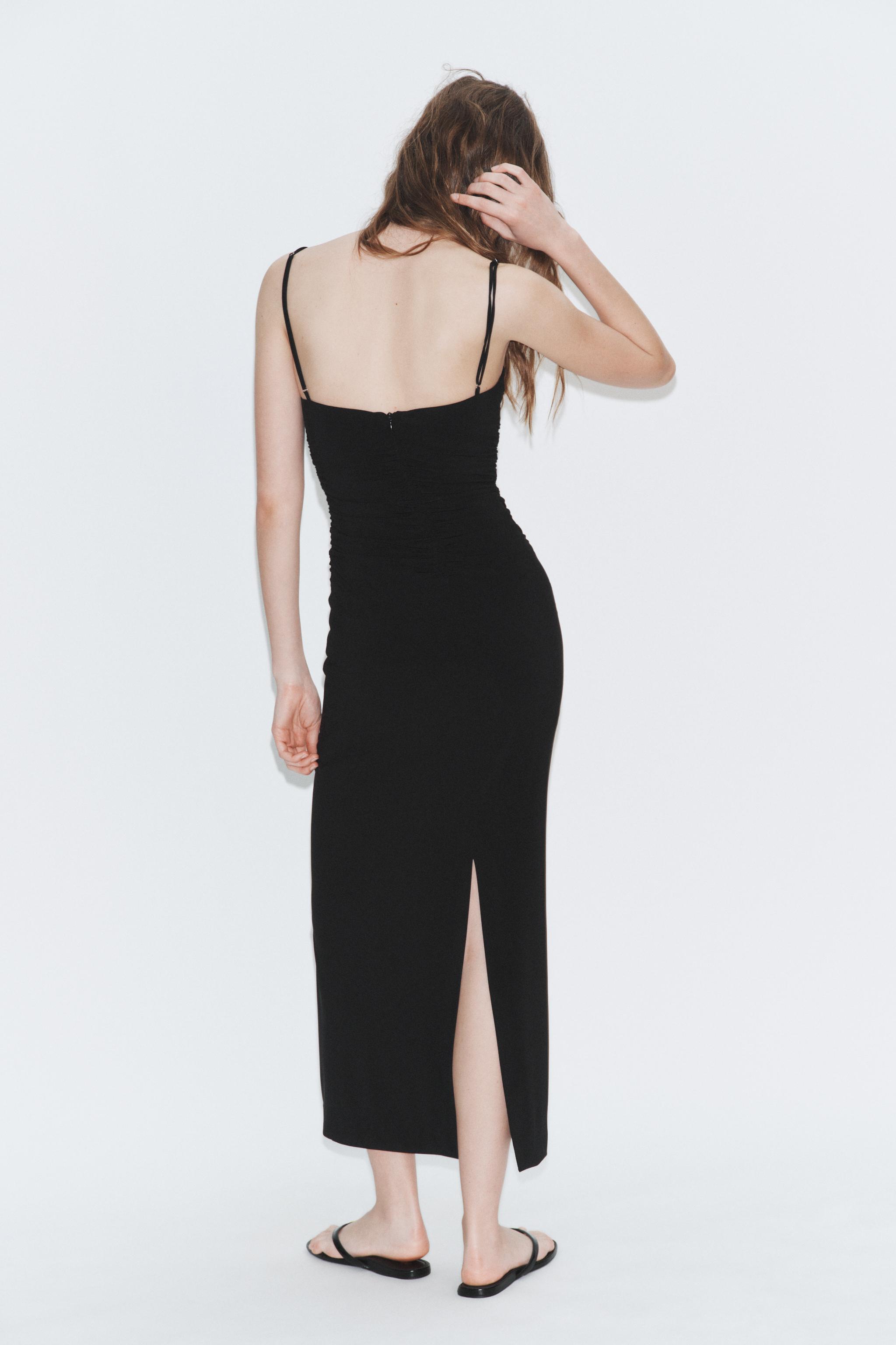 ROBE MI-LONGUE À BRETELLES ET PLIS